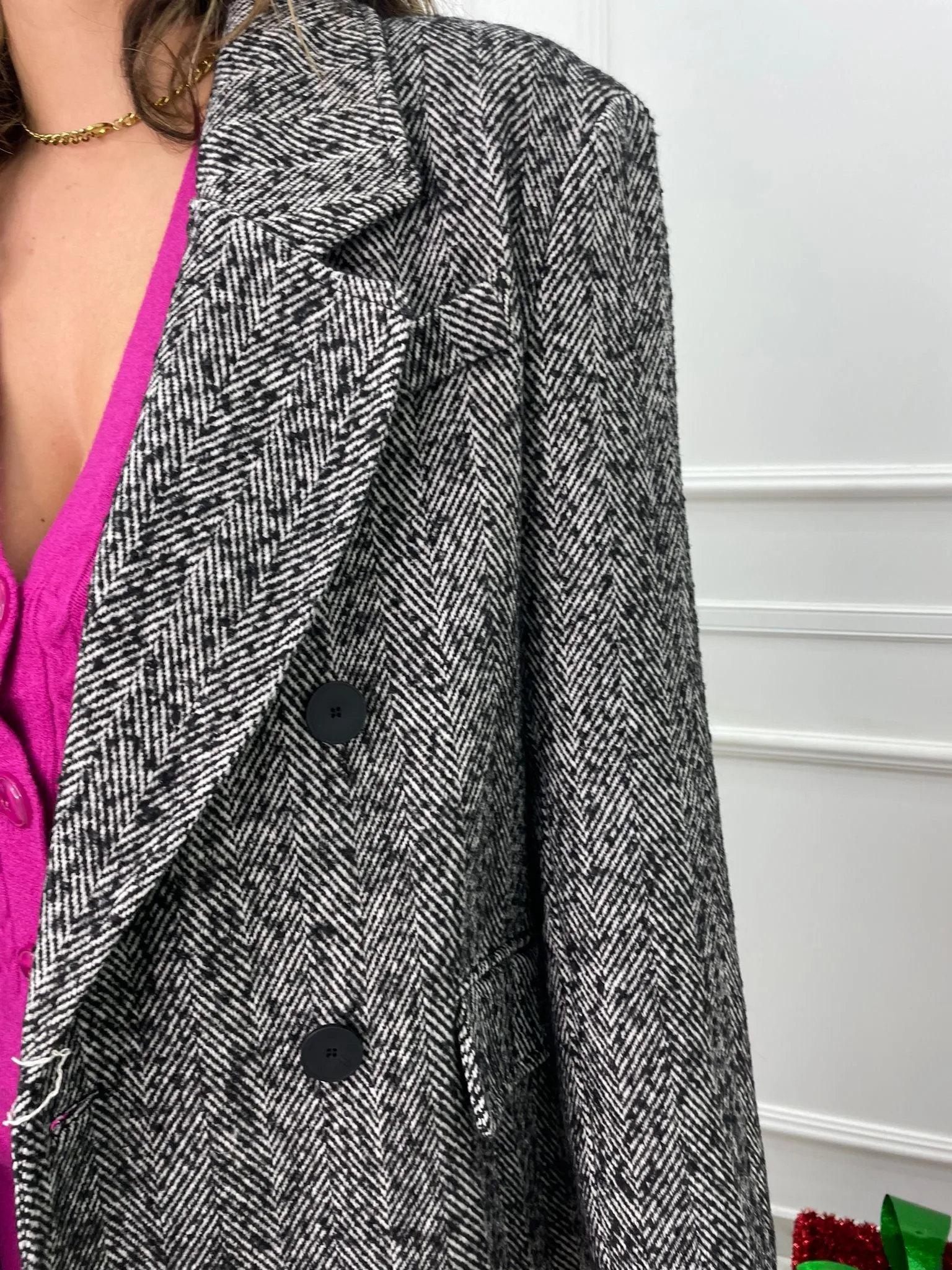 Long wool double-breasted coat.